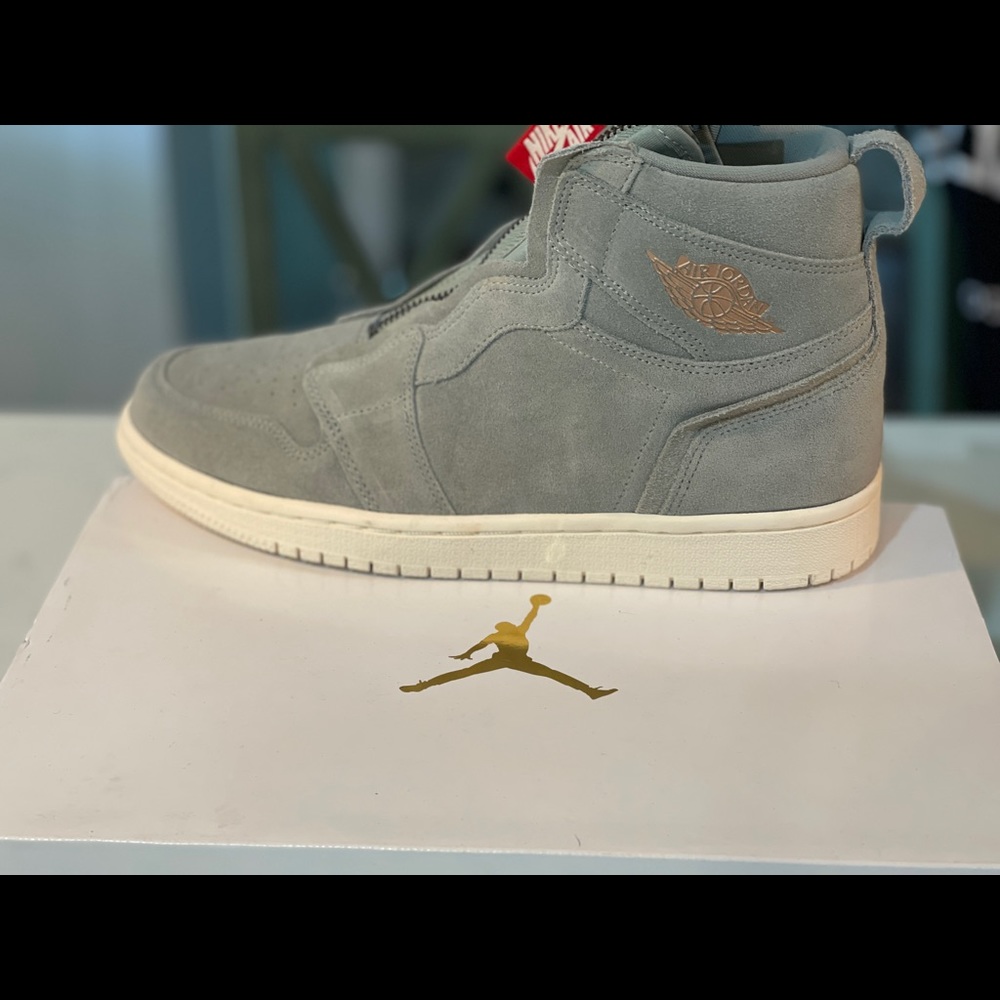 Woman’s 8.5 Air Jordan 1 Nike zip high top